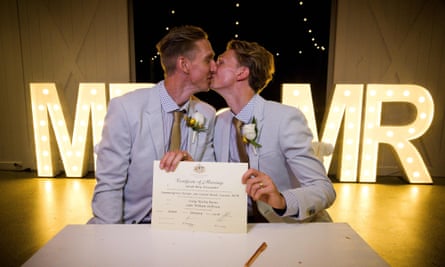 Australian Commonwealth Games sprinter Craig Burns (left) and partner Luke Sullivan at their marriage ceremony at Summergrove Estate, New South Wales.