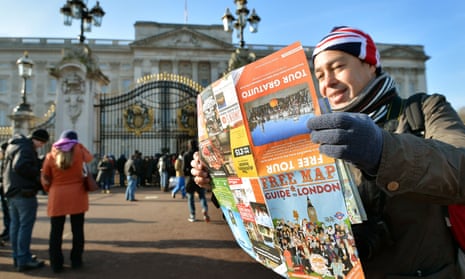 Tourists outside Buckingham Palace.