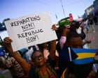 ‘Reparations now’: King and Burham face protests at Antigua Commonwealth summit