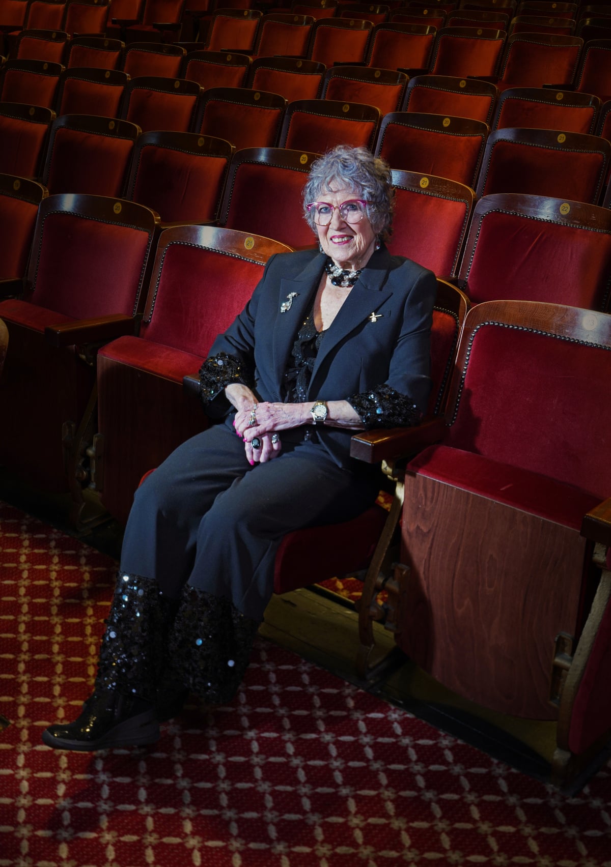 Beryl Plummer sitting in stalls seats