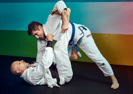 Marcel Theroux rolling someone on the jiu-jitsu mat