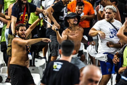 Marseille fans fight among themselves after a Champions League qualifier against Panathinaikos in August