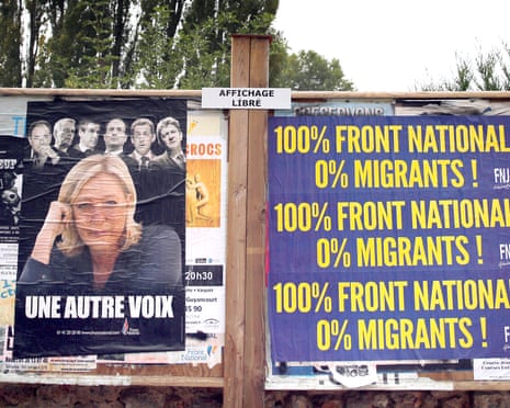 An electoral board showing France's far-right National Front president Marine Le Pen and reading: 100% National Front. 0% migrants is pictured during a demonstration in Forges-les-Bains, south of Paris, France, Saturday, Oct. 8, 2016. French villagers are protesting the arrival of migrants who are being spread out around the country as the government shuts down the slum-like camp in Calais that has become a flashpoint in Europe’s migrant crisis. (AP Photo/Christophe Ena)