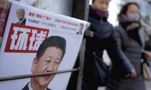 A Chinese news magazine bears photos of Chinese president Xi Jinping and US president Donald Trump in Beijing on Thursday