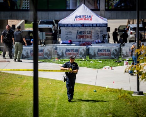 Law enforcement tapes off an area after Charlie Kirk was fatally shot on the Utah Valley University campus on Wednesday