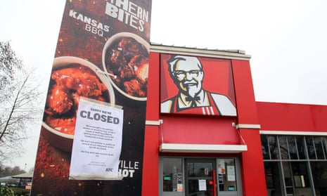 A closed sign outside a KFC restaurant in Ashford, Kent.