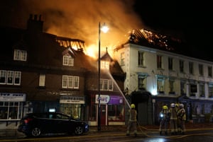 Midhurst, UK: firefighters deal with a fire at a 400-year-old hotel in West Sussex