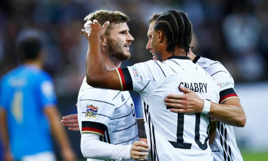 Timo Werner (left) celebrates after scoring Germany’s fourth goal against Italy.
