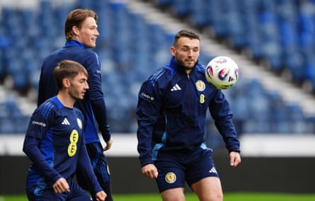 John McGinn (right) in training with Scotland