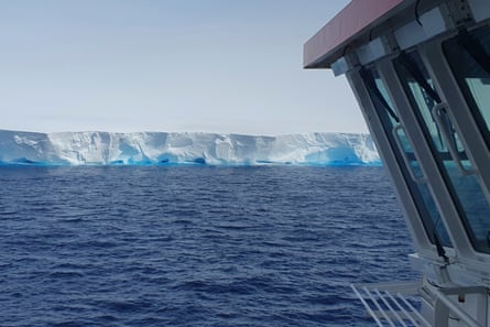The RSS David Attenborough passes by the A23a iceberg.