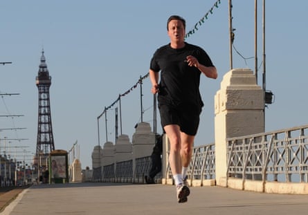 David Cameron running with Blackpool Tower in the background