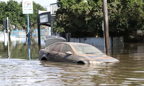 A car submerged by flood waters in Lismore during the major floods of the past week. The Climate Council says ‘too many leaders’ have been silent or absent on the climate crisis driving natural disasters.