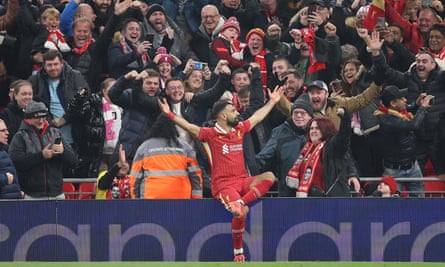 Mohamed Salah celebrates in front of the Liverpool faithful after seeing off Aston Villa earlier in the month