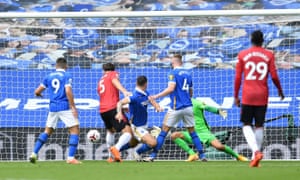 Brighton & Hove Albion’s Lewis Dunk scores an own goal as he challenges for the ball with Manchester United’s Harry Maguire.