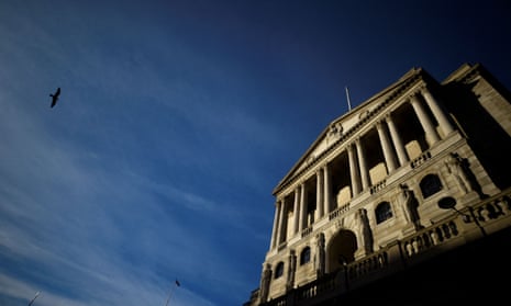 A bird flies past The Bank of England in the City of London