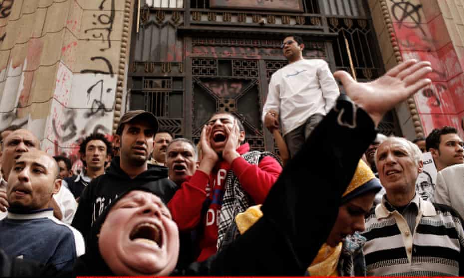 Protesters in front of Cairo's high court, where Alaa Abd el-Fattah and four others were charged with inciting violence, March 2013.