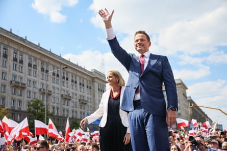 Rafał Trzaskowski and his wife, Malgorzata Trzaskowska, attend a rally in Warsaw.