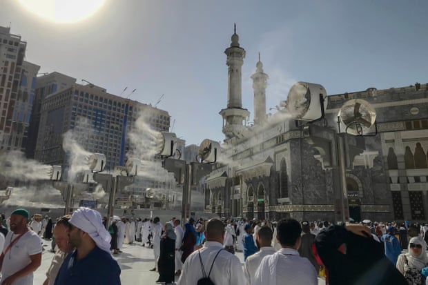 Fans spray water on Muslim pilgrims around the Grand Mosque in the run up to the annual Hajj pilgrimage in Mecca, Saudi Arabia.