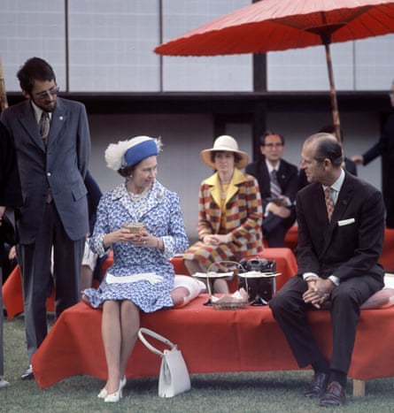 The Queen and Prince Philip taking tea during a state visit to Japan in 1975.