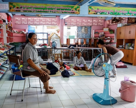 People rest at a shelter, after recent clashes along the disputed border between the two countries, in Surin province, Thailand, on Thursday, 24 July 2025.