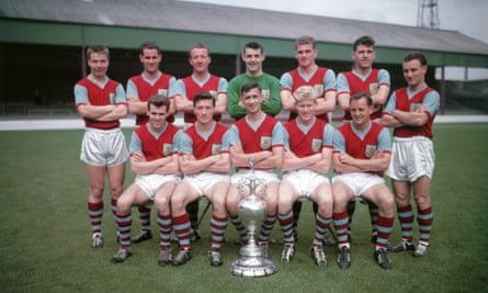 Jimmy McIlroy, front row, second from left, with Burnley’s 1959-60 First Division championship team. Jimmy Adamson, the captain, is seated at centre.