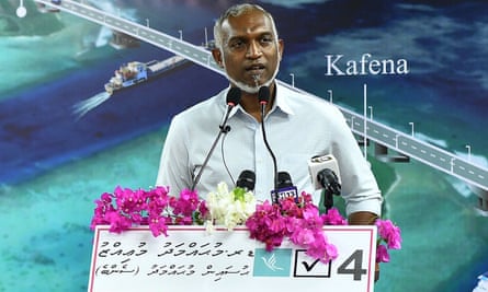 People’s National Congress (PNC) candidate Mohamed Muizzu speaks during an election campaing rally in Thinadhoo on 26 September before the second round of Maldives’ presidential election.