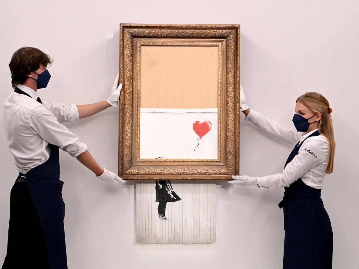 Banksy sets auction record with £18.5m sale of shredded painting | Banksy | The Guardian