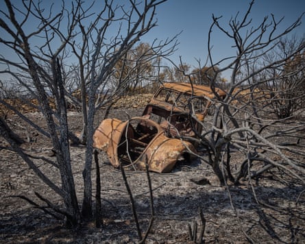 A vintage Citreon car burnt by a wildfire in Saint-Laurent-de-la-Cabrerisse, France