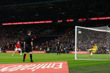Victor Lindelöf watches his penalty beat Robert Sánchez to put Manchester United into the FA Cup final.