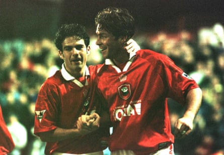 Ashley Ward celebrates with team-mate Nicky Eaden after scoring for Barnsley against Coventry at Oakwell.