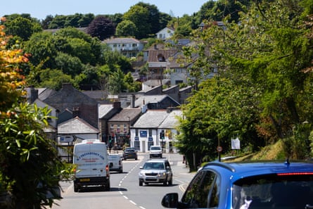 Vehicles driving down a road running through Camelford