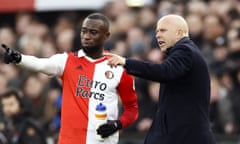 Arne Slot delivers instructions to Feyenoord’s Lutsharel Geertruida