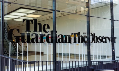 An image of the Guardian and Observer office in King's Cross, showing the logos of both newspapers.