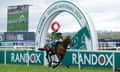 Paul Townend riding I Am Maximus celebrates winning the 2024 Grand National Handicap Chase.
