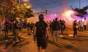The scene in Minneapolis on Wednesday night. As they did on Tuesday night, police fired rubber bullets and teargas to try to disperse crowds.