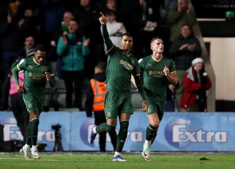 Morgan Whittaker of Plymouth Argyle celebrates scoring their team's third goal with teammates to make it 3=3 against Birmingham City.
