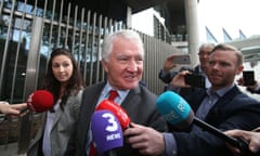 Former Anglo Irish Bank chair Seán Fitzpatrick leaves the Dublin circuit criminal court after a judge directed jurors to find him not guilty of fraud.