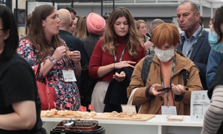 Attendees enjoy plant-based treats at the event.
