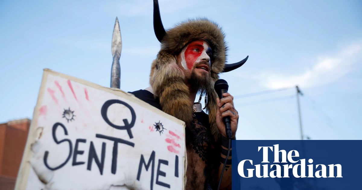 US Capitol rioter photographed wearing horns pleads guilty