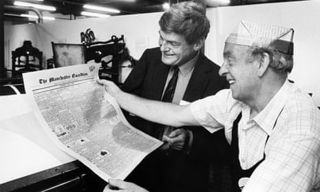 Peter Preston, when editor of the Guardian, watches an archive copy of the paper come off an ancient press.
