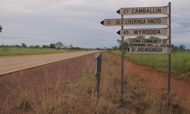 A Western Australian road sign points to Camballin, a non-Indigenous remote community not under threat of closure, and Jarlmadangah and Looma, Indigenous communities that could be closed. 