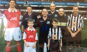 Eight-year-old Graham Searles takes his place as Arsenal’s mascot for their visit to Newcastle in February 1999. The game ended 1-1.