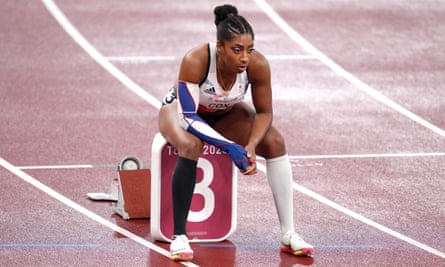 Kadeena Cox sits on the starting block before the 400m in Tokyo.