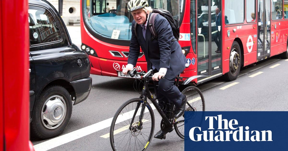 Back On His Bike Boris Johnson Receives A Motorcycle For Christmas Politics The Guardian