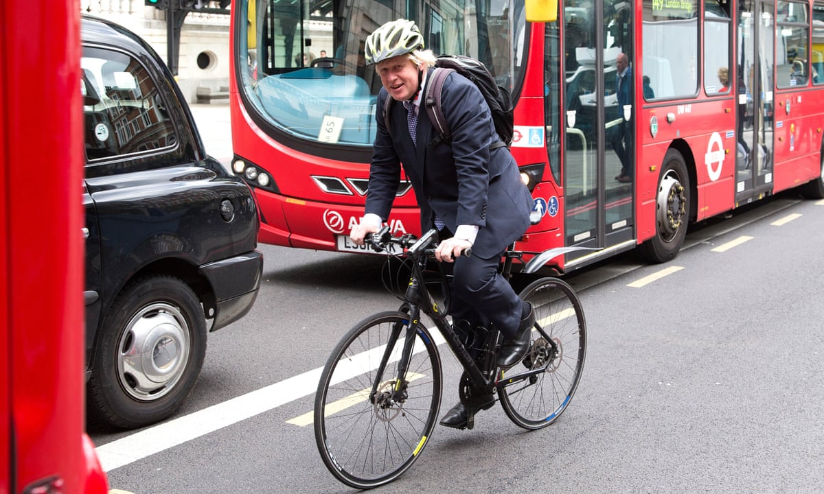Back On His Bike Boris Johnson Receives A Motorcycle For Christmas Politics The Guardian