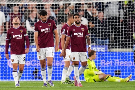 West Ham United players appear dejected after Chelsea’s Moises Caicedo (not pictured) scores his side’s fourth goal of the game.