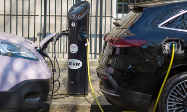 Cars being charged at an electric car charging point in central London