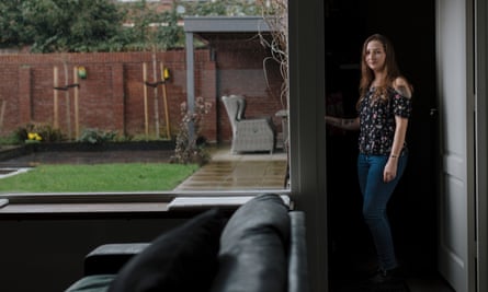 Zoraya ter Beek standing in a doorway in her home, next to a large window