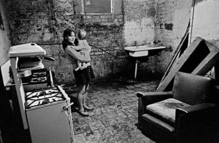 Mrs Thomas in her cellar kitchen, Toxteth, Liverpool, 1971.