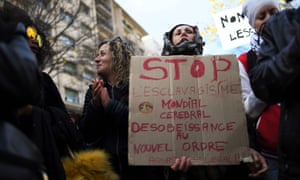 People take part in a demonstration against slavery in Libya on 25 November.